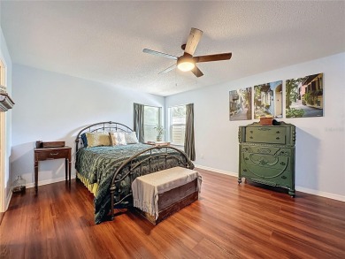 Welcome to this well-maintained 3-bedroom, 2-bath pool home on a on The Grand Club Cypress Course in Florida - for sale on GolfHomes.com, golf home, golf lot