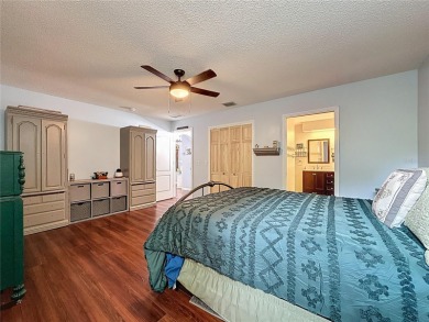 Welcome to this well-maintained 3-bedroom, 2-bath pool home on a on The Grand Club Cypress Course in Florida - for sale on GolfHomes.com, golf home, golf lot