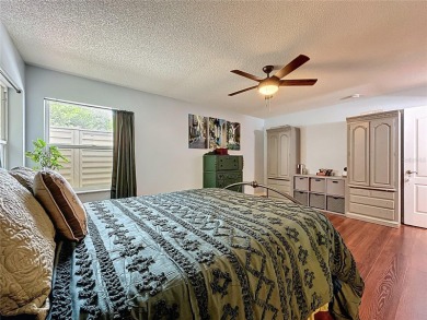 Welcome to this well-maintained 3-bedroom, 2-bath pool home on a on The Grand Club Cypress Course in Florida - for sale on GolfHomes.com, golf home, golf lot