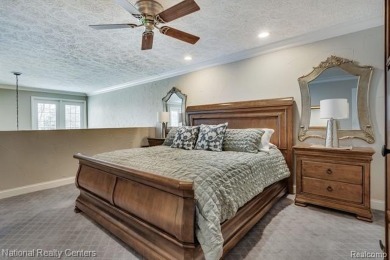 Step into European elegance with this pristine condo, perfectly on Pine Knob Golf Club - Hawk in Michigan - for sale on GolfHomes.com, golf home, golf lot