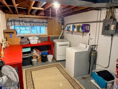 Spacious and beautifully updated duplex featuring 3 bedrooms and on The Oaks At Kincheloe in Michigan - for sale on GolfHomes.com, golf home, golf lot