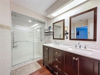 Welcome to this well-maintained 3-bedroom, 2-bath pool home on a on The Grand Club Cypress Course in Florida - for sale on GolfHomes.com, golf home, golf lot