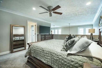 Step into European elegance with this pristine condo, perfectly on Pine Knob Golf Club - Hawk in Michigan - for sale on GolfHomes.com, golf home, golf lot