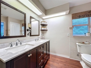 Welcome to this well-maintained 3-bedroom, 2-bath pool home on a on The Grand Club Cypress Course in Florida - for sale on GolfHomes.com, golf home, golf lot