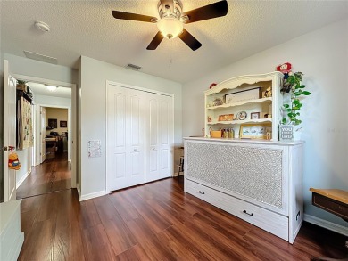 Welcome to this well-maintained 3-bedroom, 2-bath pool home on a on The Grand Club Cypress Course in Florida - for sale on GolfHomes.com, golf home, golf lot