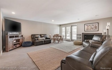 Step into European elegance with this pristine condo, perfectly on Pine Knob Golf Club - Hawk in Michigan - for sale on GolfHomes.com, golf home, golf lot