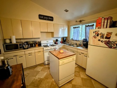 Spacious and beautifully updated duplex featuring 3 bedrooms and on The Oaks At Kincheloe in Michigan - for sale on GolfHomes.com, golf home, golf lot
