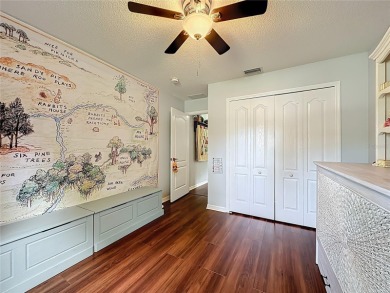 Welcome to this well-maintained 3-bedroom, 2-bath pool home on a on The Grand Club Cypress Course in Florida - for sale on GolfHomes.com, golf home, golf lot