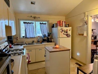 Spacious and beautifully updated duplex featuring 3 bedrooms and on The Oaks At Kincheloe in Michigan - for sale on GolfHomes.com, golf home, golf lot