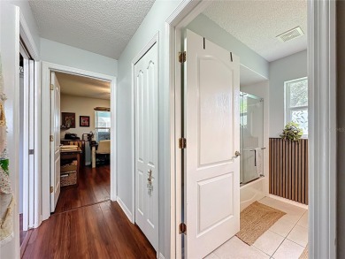 Welcome to this well-maintained 3-bedroom, 2-bath pool home on a on The Grand Club Cypress Course in Florida - for sale on GolfHomes.com, golf home, golf lot