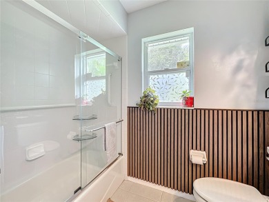 Welcome to this well-maintained 3-bedroom, 2-bath pool home on a on The Grand Club Cypress Course in Florida - for sale on GolfHomes.com, golf home, golf lot