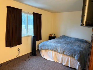Spacious and beautifully updated duplex featuring 3 bedrooms and on The Oaks At Kincheloe in Michigan - for sale on GolfHomes.com, golf home, golf lot