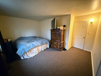 Spacious and beautifully updated duplex featuring 3 bedrooms and on The Oaks At Kincheloe in Michigan - for sale on GolfHomes.com, golf home, golf lot