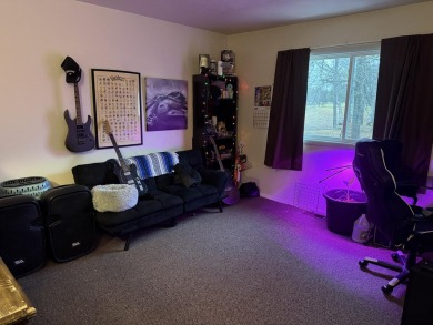 Spacious and beautifully updated duplex featuring 3 bedrooms and on The Oaks At Kincheloe in Michigan - for sale on GolfHomes.com, golf home, golf lot