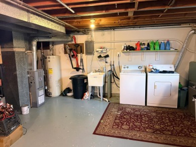 Spacious and beautifully updated duplex featuring 3 bedrooms and on The Oaks At Kincheloe in Michigan - for sale on GolfHomes.com, golf home, golf lot
