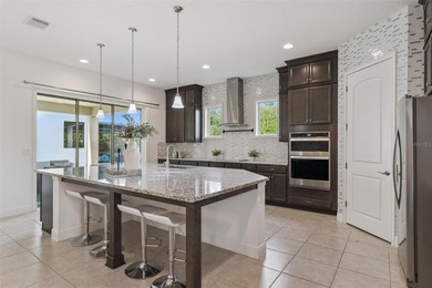 Welcome to luxurious living in the guard-gated Eagle Creek on Eagle Creek Golf Club in Florida - for sale on GolfHomes.com, golf home, golf lot