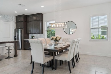 Welcome to luxurious living in the guard-gated Eagle Creek on Eagle Creek Golf Club in Florida - for sale on GolfHomes.com, golf home, golf lot