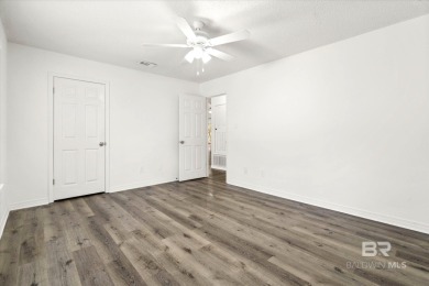 This remodeled 3-bedroom, 2-bath brick home is centrally located on Lake Forest Yacht and Country Club in Alabama - for sale on GolfHomes.com, golf home, golf lot
