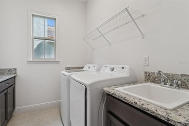 Welcome to luxurious living in the guard-gated Eagle Creek on Eagle Creek Golf Club in Florida - for sale on GolfHomes.com, golf home, golf lot