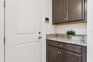 Welcome to luxurious living in the guard-gated Eagle Creek on Eagle Creek Golf Club in Florida - for sale on GolfHomes.com, golf home, golf lot