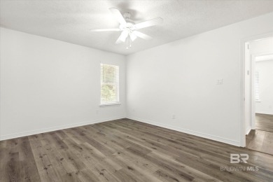 This remodeled 3-bedroom, 2-bath brick home is centrally located on Lake Forest Yacht and Country Club in Alabama - for sale on GolfHomes.com, golf home, golf lot