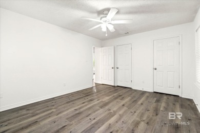 This remodeled 3-bedroom, 2-bath brick home is centrally located on Lake Forest Yacht and Country Club in Alabama - for sale on GolfHomes.com, golf home, golf lot