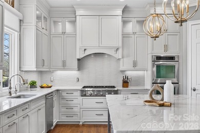 Located in the desirable Peninsula community, this home offers on The Peninsula Club in North Carolina - for sale on GolfHomes.com, golf home, golf lot