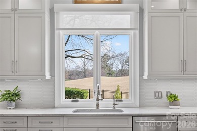 Located in the desirable Peninsula community, this home offers on The Peninsula Club in North Carolina - for sale on GolfHomes.com, golf home, golf lot