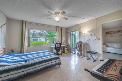 Welcome to your slice of paradise in the heart of Pompano Beach! on Wynmoor Golf Course in Florida - for sale on GolfHomes.com, golf home, golf lot