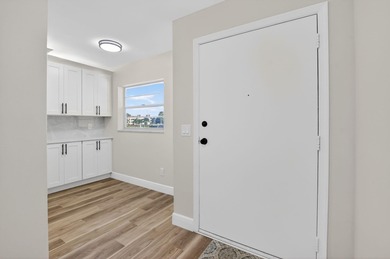 Completely remodeled and fully permitted, this secluded on Boca Dunes Golf and Country Club in Florida - for sale on GolfHomes.com, golf home, golf lot