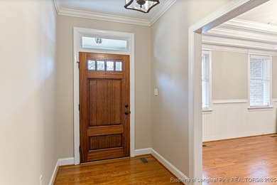 Gates Four - Welcome to this stunning 5-bedroom, 3.5-bath brick on Gates Four Golf and Country Club in North Carolina - for sale on GolfHomes.com, golf home, golf lot