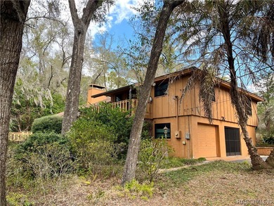 Discover a one-of-a-kind retreat with this spectacular custom on Citrus Springs Country Club in Florida - for sale on GolfHomes.com, golf home, golf lot