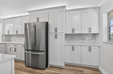 Completely remodeled and fully permitted, this secluded on Boca Dunes Golf and Country Club in Florida - for sale on GolfHomes.com, golf home, golf lot