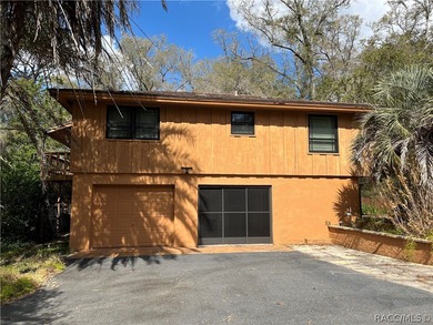 Discover a one-of-a-kind retreat with this spectacular custom on Citrus Springs Country Club in Florida - for sale on GolfHomes.com, golf home, golf lot