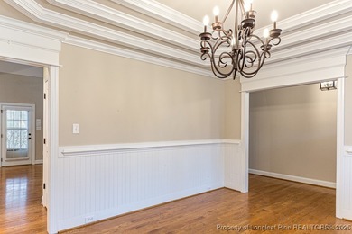 Gates Four - Welcome to this stunning 5-bedroom, 3.5-bath brick on Gates Four Golf and Country Club in North Carolina - for sale on GolfHomes.com, golf home, golf lot