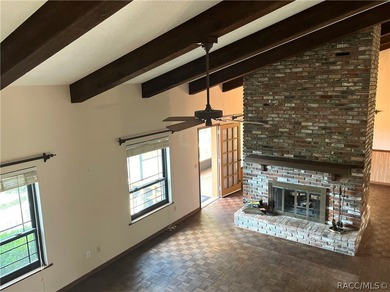 Discover a one-of-a-kind retreat with this spectacular custom on Citrus Springs Country Club in Florida - for sale on GolfHomes.com, golf home, golf lot