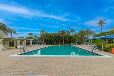 Welcome to your slice of paradise in the heart of Pompano Beach! on Wynmoor Golf Course in Florida - for sale on GolfHomes.com, golf home, golf lot