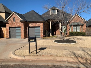 An exquisite villa in the highly sought-after Rose Creek on Rose Creek Golf Club in Oklahoma - for sale on GolfHomes.com, golf home, golf lot