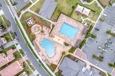 Welcome to luxurious living in the guard-gated Eagle Creek on Eagle Creek Golf Club in Florida - for sale on GolfHomes.com, golf home, golf lot