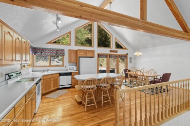 Surrounded by towering evergreens and endless mountain views on Star Valley RV Golf Course in Wyoming - for sale on GolfHomes.com, golf home, golf lot