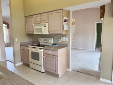Welcome to this desirable end-unit villa in the vibrant 55+ golf on Heritage Pines Country Club in Florida - for sale on GolfHomes.com, golf home, golf lot