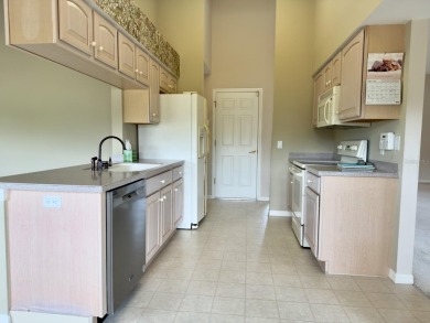 Welcome to this desirable end-unit villa in the vibrant 55+ golf on Heritage Pines Country Club in Florida - for sale on GolfHomes.com, golf home, golf lot