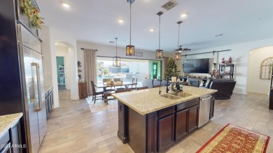 Welcome to this breathtaking single-story home, offering 4 on Estrella Mountain Ranch Golf Course in Arizona - for sale on GolfHomes.com, golf home, golf lot