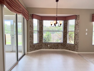 Welcome to this desirable end-unit villa in the vibrant 55+ golf on Heritage Pines Country Club in Florida - for sale on GolfHomes.com, golf home, golf lot