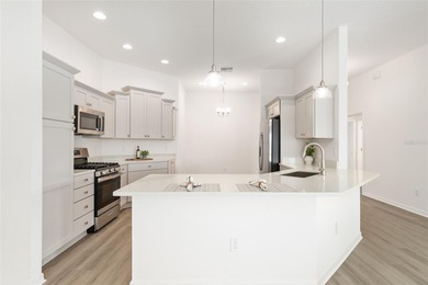 STUNNING BARELY LIVED IN MOCKINGBIRD MODEL WITH 2-CAR + GOLF on Pennbrooke Fairways in Florida - for sale on GolfHomes.com, golf home, golf lot