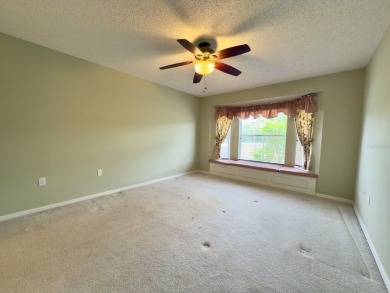 Welcome to this desirable end-unit villa in the vibrant 55+ golf on Heritage Pines Country Club in Florida - for sale on GolfHomes.com, golf home, golf lot