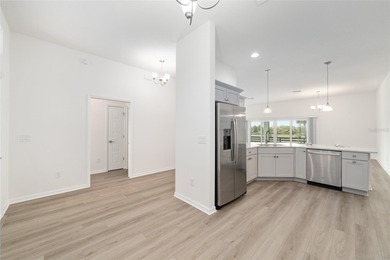 STUNNING BARELY LIVED IN MOCKINGBIRD MODEL WITH 2-CAR + GOLF on Pennbrooke Fairways in Florida - for sale on GolfHomes.com, golf home, golf lot