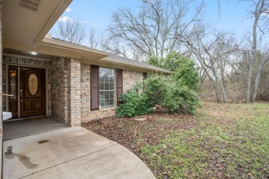 Welcome to this charming 3-bedroom, 2-bathroom home located in on White Bluff Resort - New Course in Texas - for sale on GolfHomes.com, golf home, golf lot