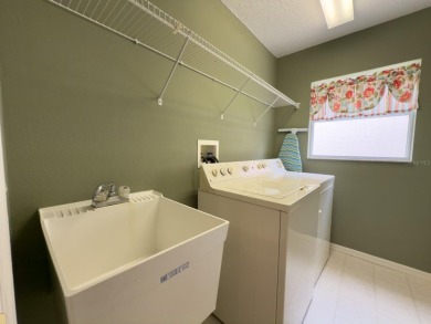 Welcome to this desirable end-unit villa in the vibrant 55+ golf on Heritage Pines Country Club in Florida - for sale on GolfHomes.com, golf home, golf lot