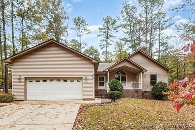 Welcome to this beautiful 3-bedroom, 2-bath home located in a on Carolina Trace Country Club in North Carolina - for sale on GolfHomes.com, golf home, golf lot